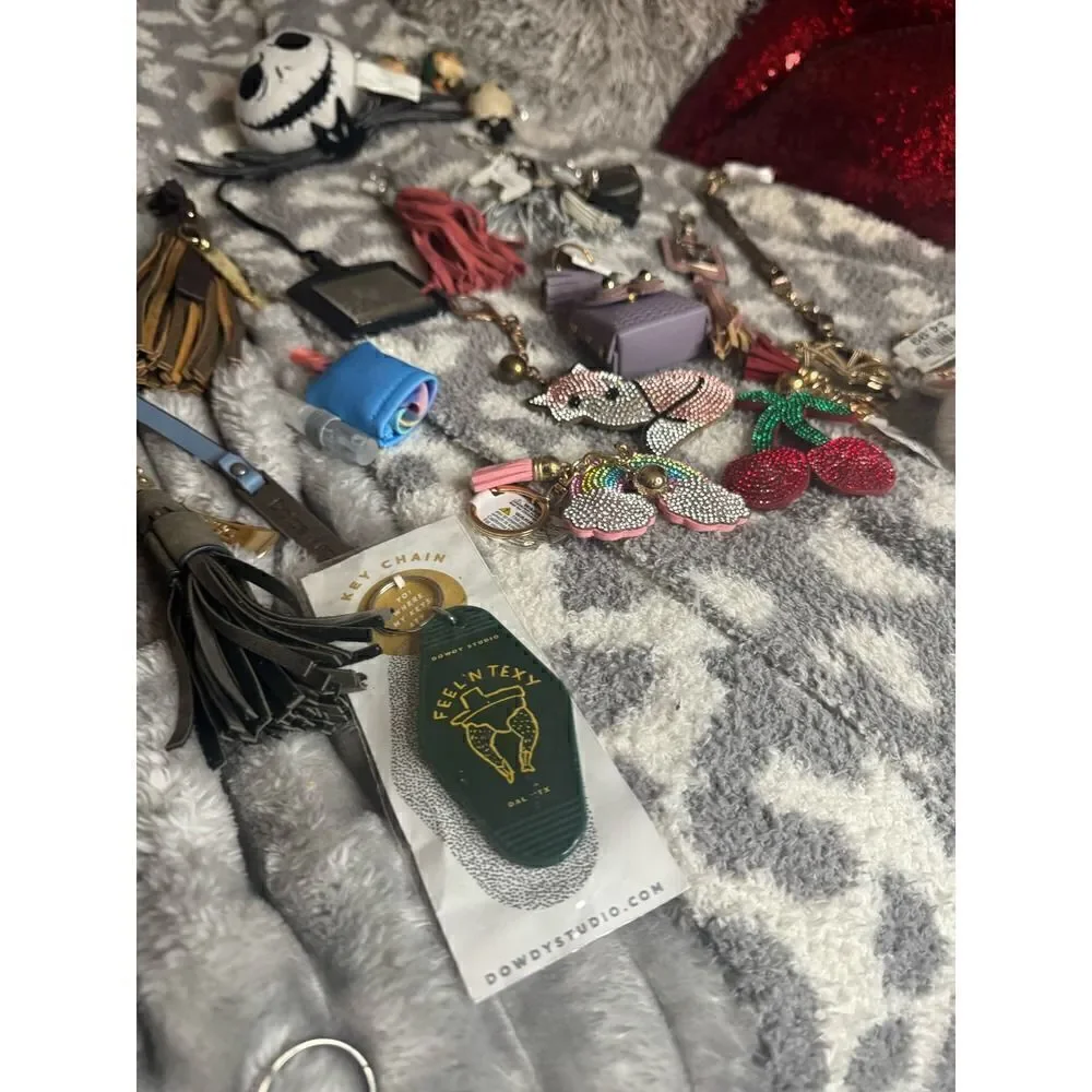 Lot of designer keychains,bag charms bling disney tassell